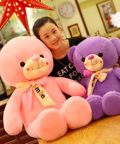 Smiling scarf teddy bear
